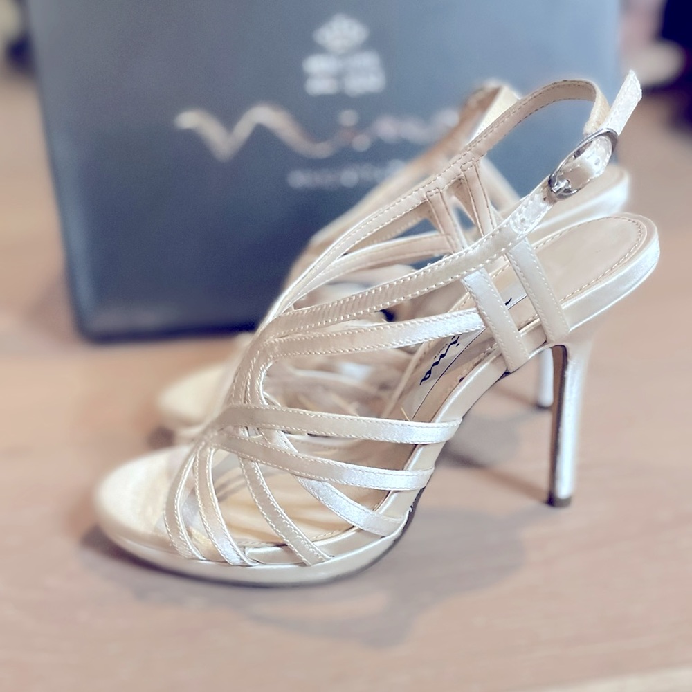 Brand new in box w/tags never worn ivory/white heels with straps never worn sz 5